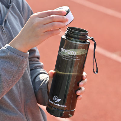 Bouteille de boisson directe portable en PET écologique de 1 litre avec marque de capacité pour le sport de fitness