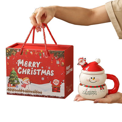 Le bonhomme de neige de Noël, une tasse de café, une tasse de ceramique, une tasse Mike, une boîte cadeau.