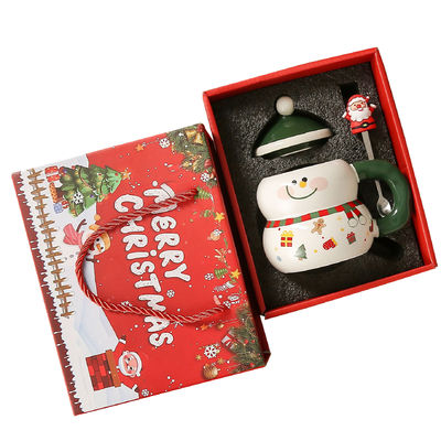 Le bonhomme de neige de Noël, une tasse de café, une tasse de ceramique, une tasse Mike, une boîte cadeau.