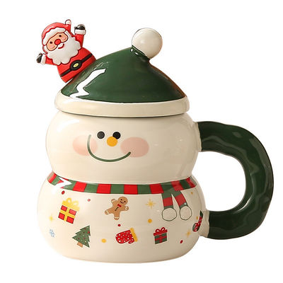 Le bonhomme de neige de Noël, une tasse de café, une tasse de ceramique, une tasse Mike, une boîte cadeau.