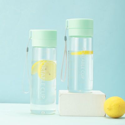 Bouteille d'eau en plastique transparent pour enfants avec logo personnalisé sans BPA et boisson directe