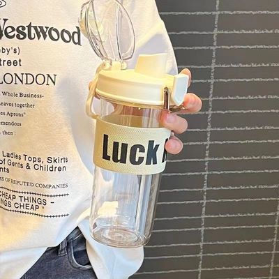 Bouteille d'eau en plastique de sport portable de 600 ml avec manche et grande capacité