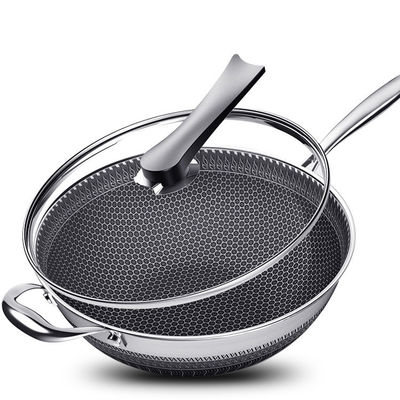 Wok en acier inoxydable à nid de miel durable pour un chauffage rapide dans une cuisine personnalisée