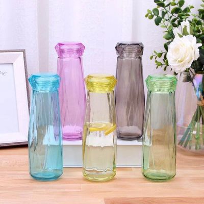 Bouteille d'eau en verre étanche au style minimaliste pour le camping et le sport
