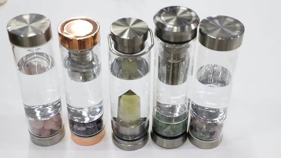 Bouteille d'eau en verre avec couvercle pour l' énergie de guérison