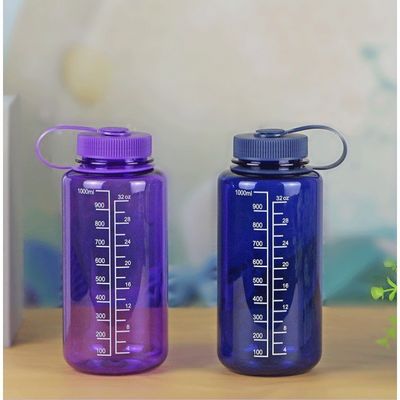 Bouteille d'eau liquide transparente en plastique sans Bpa de 1000 ml avec échelle pour les sports de plein air