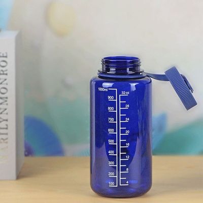 Bouteille d'eau liquide transparente en plastique sans Bpa de 1000 ml avec échelle pour les sports de plein air