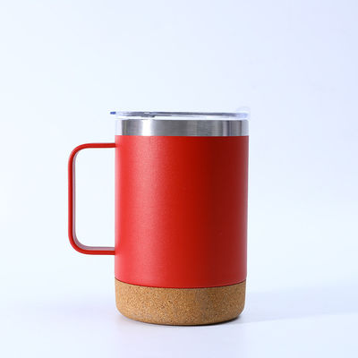 Une tasse de café de bureau en acier inoxydable avec fond en liège et poignée